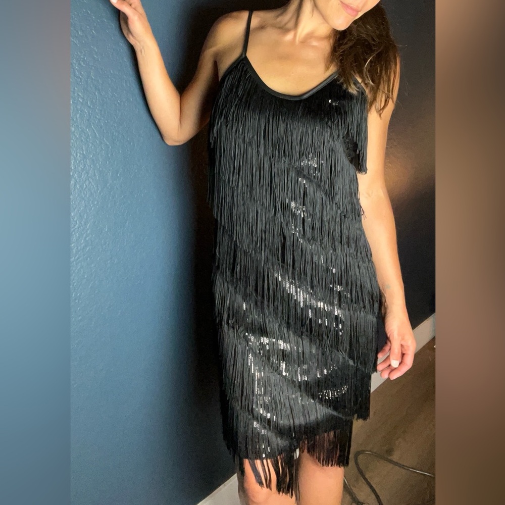 Cute tassels dress with sequins.